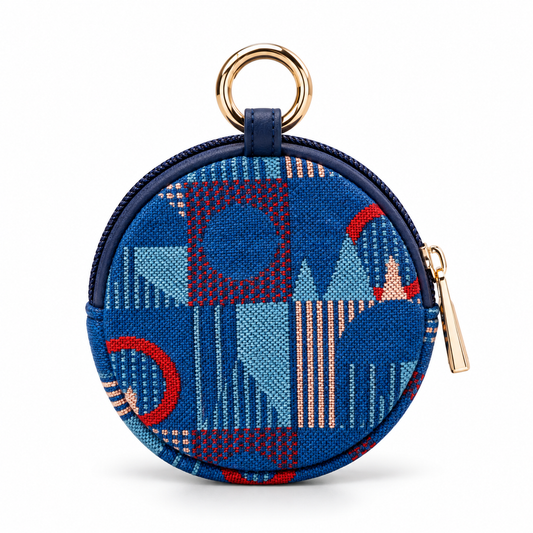 Back of blue Piccadilly Line moquette round coin purse