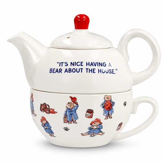 Official Paddington Bear Tea-for-One ceramic teapot and matching cup featuring the quote "It's Nice Having a Bear About the House" on a white studio background.