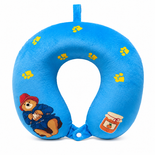 Blue children's travel neck pillow with Paddington Bear design on a white background