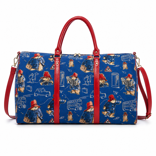 A blue Patagonia-themed duffel bag with red leather handles and straps, featuring an all-over print of the character Patagonia in red and blue, set against a plain white background.