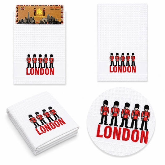 White cotton waffle tea towel with embroidered London guards and red “London” text, displayed on a white background.