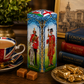 Tea canister with British soldiers design on a table with tea and books
