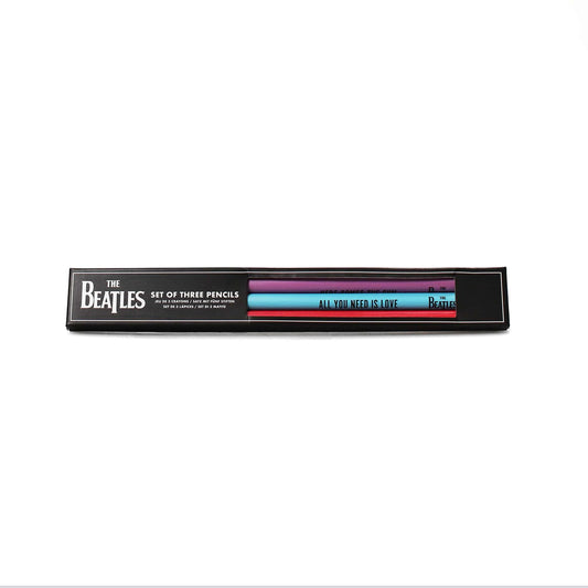 Set of three pencils with 'The Beatles' branding on a white background