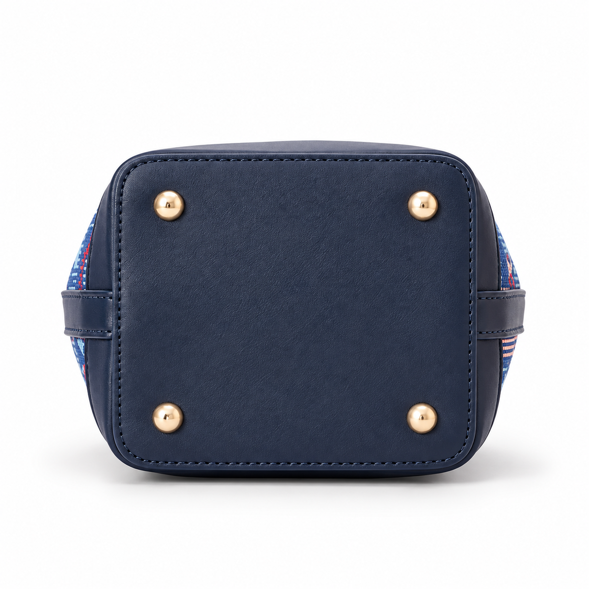 Structured navy base of Piccadilly Line bucket bag with protective feet