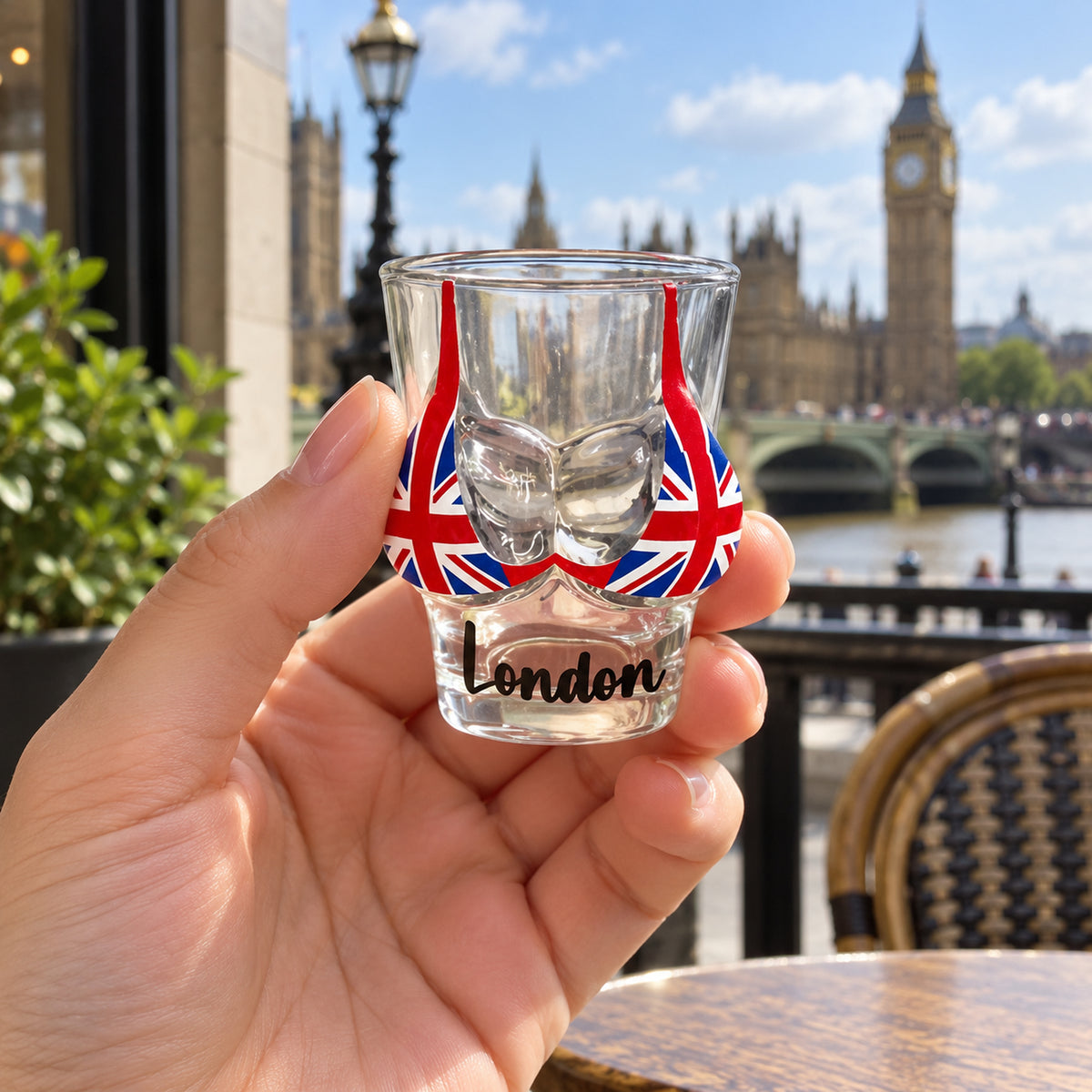 London Base Shot Glass shown naturally in use in the UK