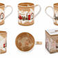 London landmark souvenir mug shown in a clean white studio composition with ornate pink and gold patterning