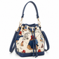 Cream Paddington Bear print bucket bag with navy trim, drawstring closure, gold-tone hardware and detachable straps.