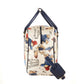 ide view of the Paddington Bear print laptop bag showing navy handles, gold-tone hardware and detachable shoulder strap