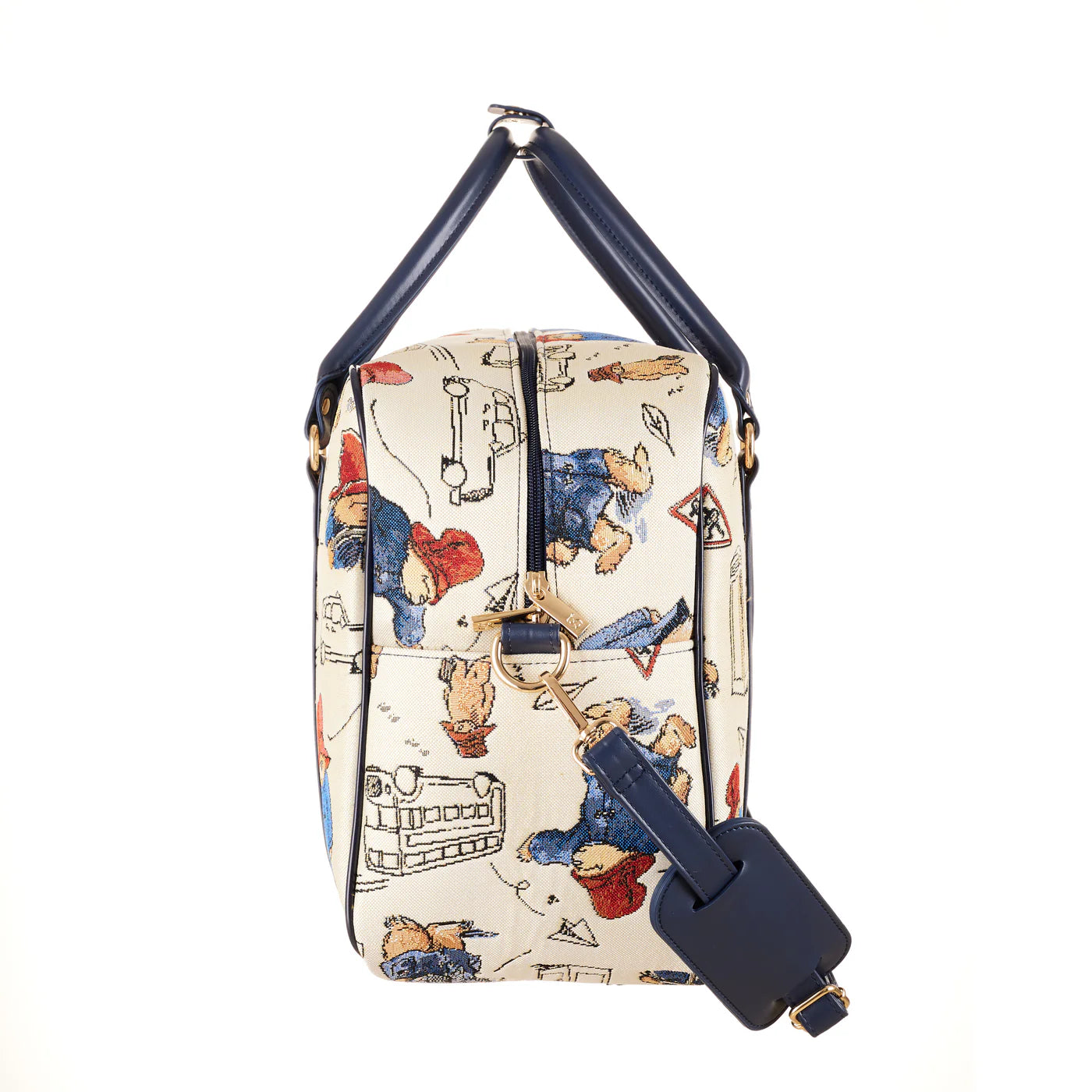 ide view of the Paddington Bear print laptop bag showing navy handles, gold-tone hardware and detachable shoulder strap