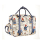 Side view of the Paddington Bear print laptop bag showing navy handles, gold-tone hardware and detachable shoulder strap.