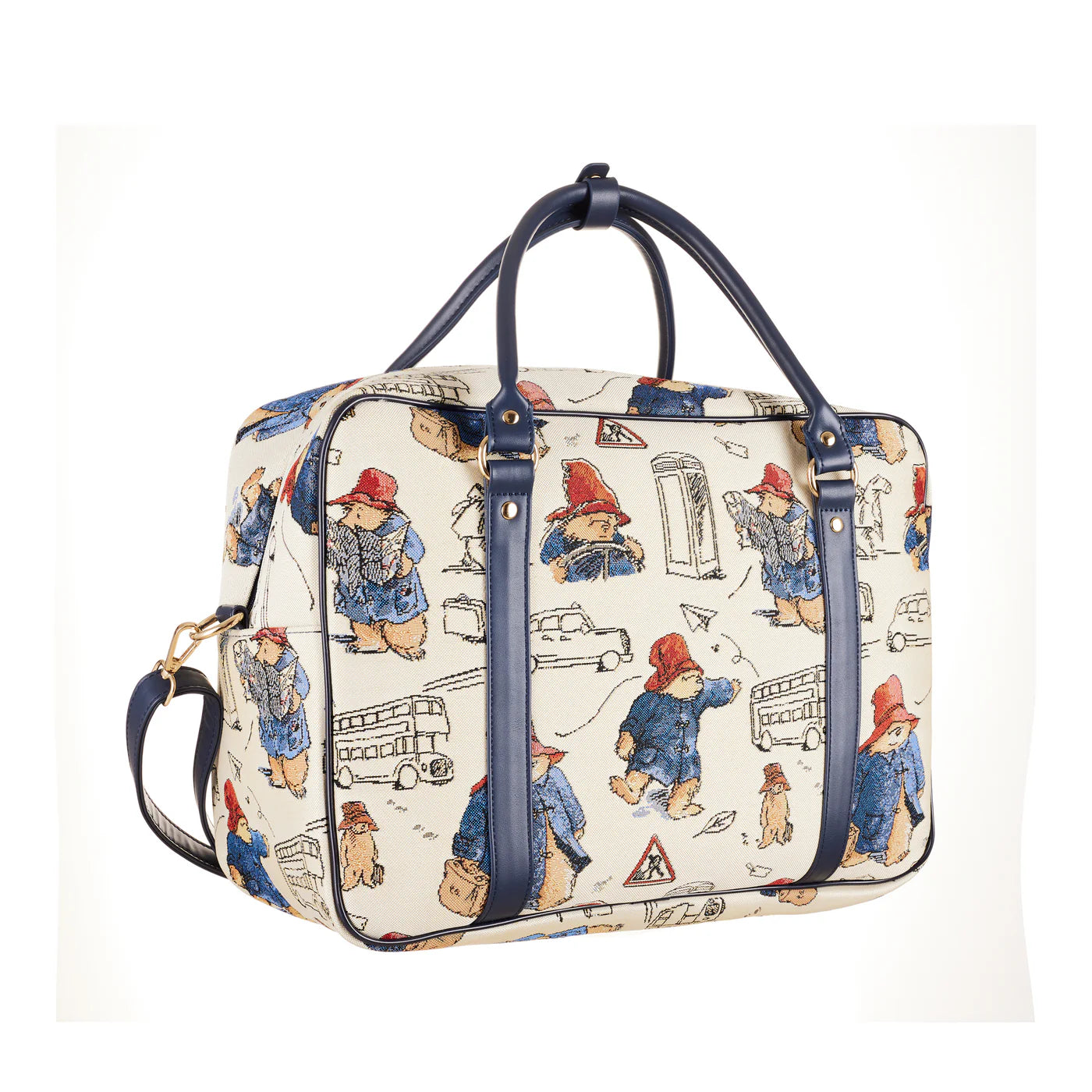 Side view of the Paddington Bear print laptop bag showing navy handles, gold-tone hardware and detachable shoulder strap.